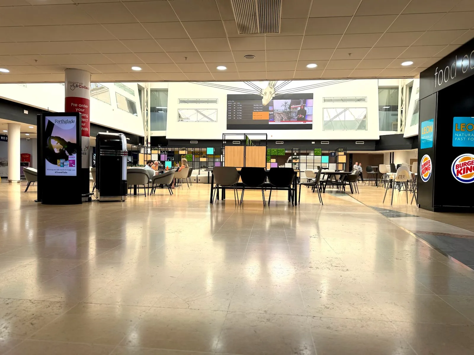 Forthglade advertising on a digital screen in the LeShuttle food court